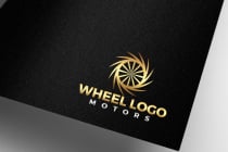 Creative Tire Golden Wheel Logo Design Screenshot 2